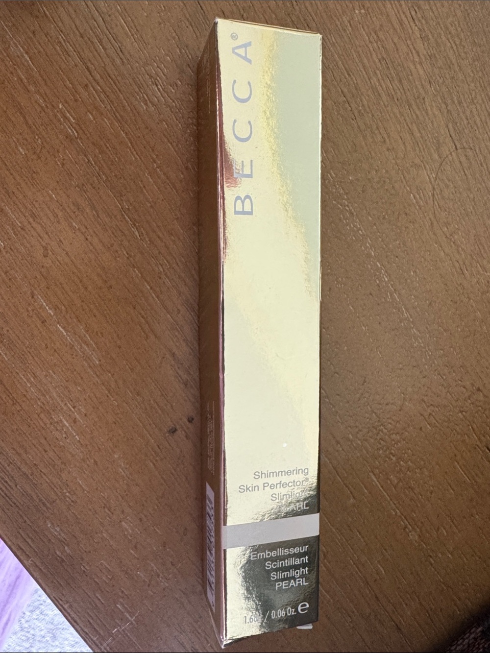 BECCA Shimmering Skin Perfector Liquid Highlighter - Gold Pearl Packaging